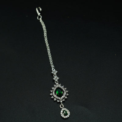 Elegant Silver Bindi with Green Stone