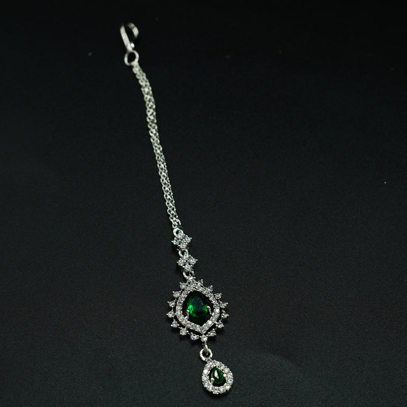 Elegant Silver Bindi with Green Stone