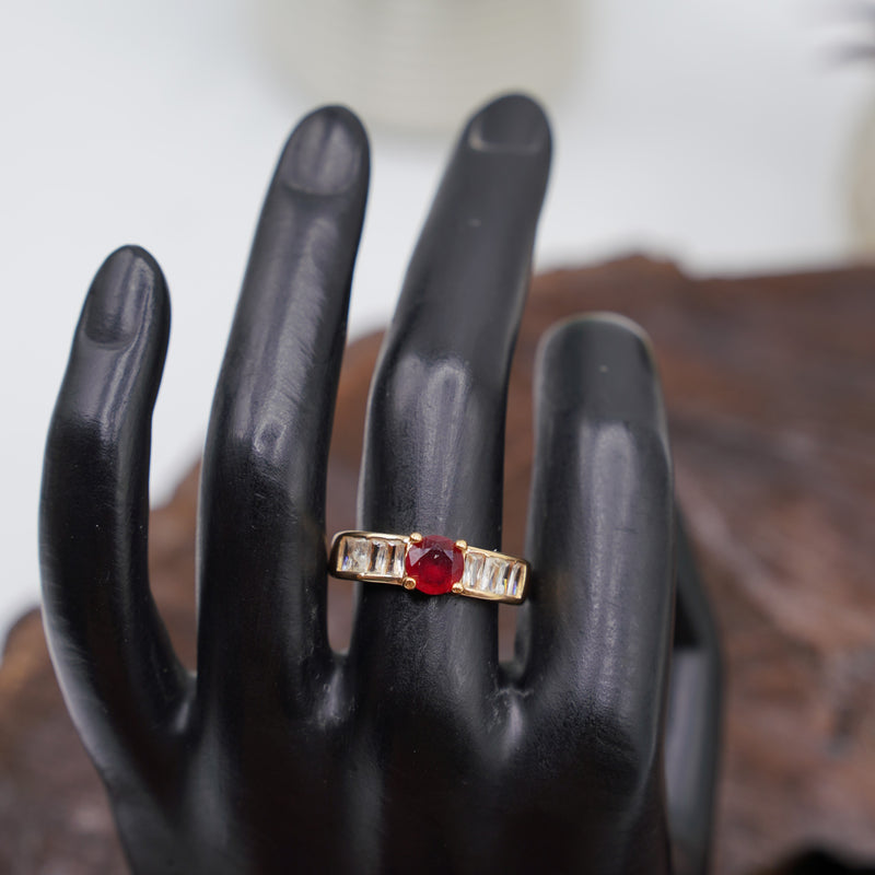 Gold Ring with Red Center Stone