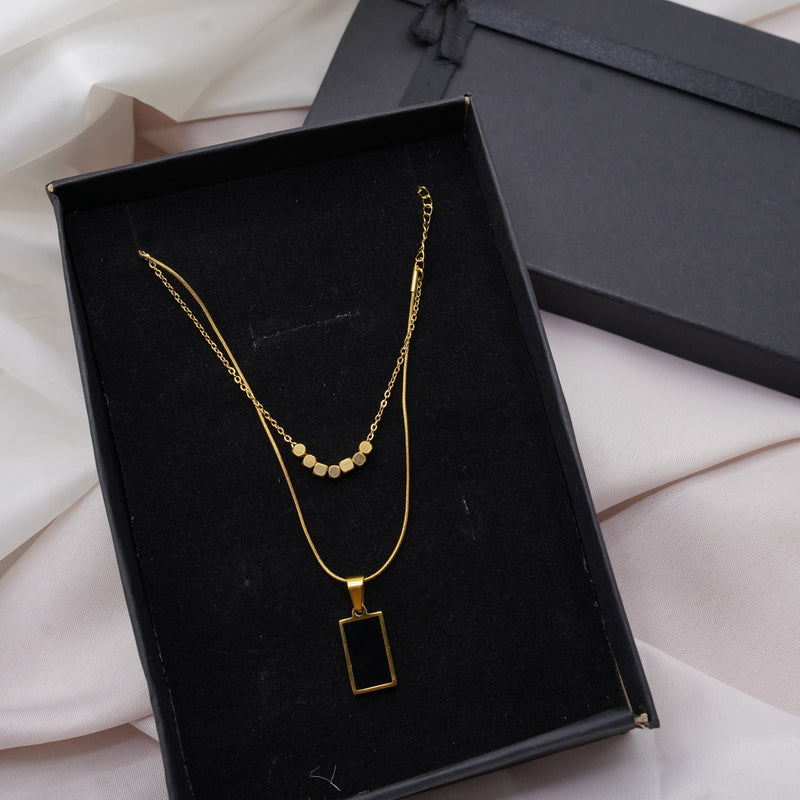 Dual Gold Necklaces – Beaded Curve & Black Pendant