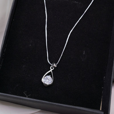 Teardrop Silver Necklace with Clear Gemstone .