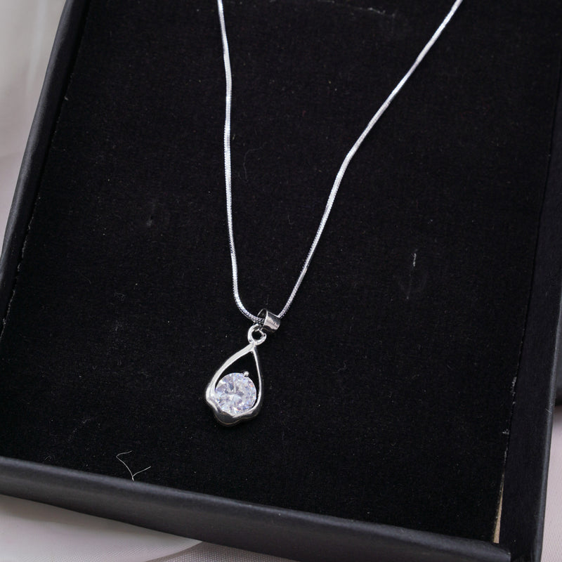 Teardrop Silver Necklace with Clear Gemstone .